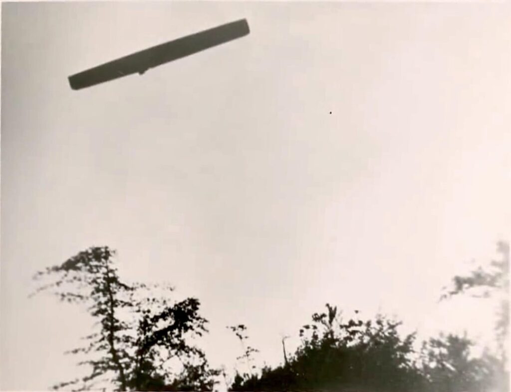 The greatest UFO photos taken of Giant cigar mother-ship over New York in 1967. It was seen ejecting smaller saucers seen in photo 4. These are real images taken by Joseph Ferriere.
