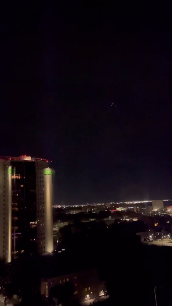 Helicopter follows UFO with Strobe Light. Filmed 30 minutes ago in Winnipeg, Canada.
