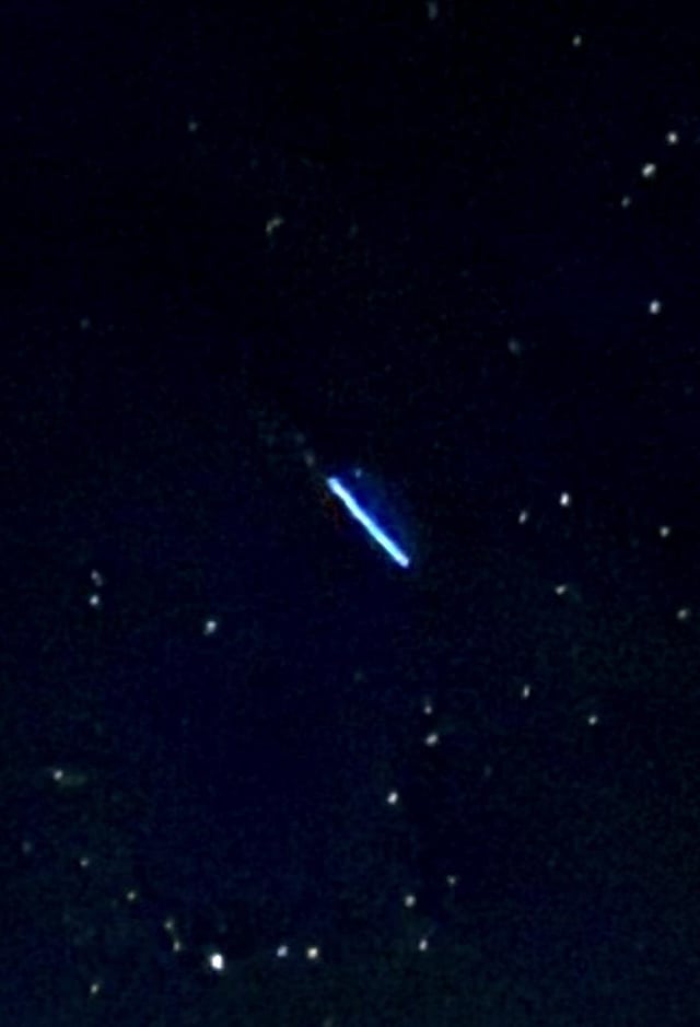 Green cigar shaped UFO caught on photo in upstate NY