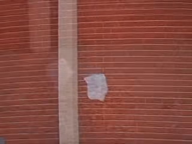 strange object moving through urban environment propelled by invisible force