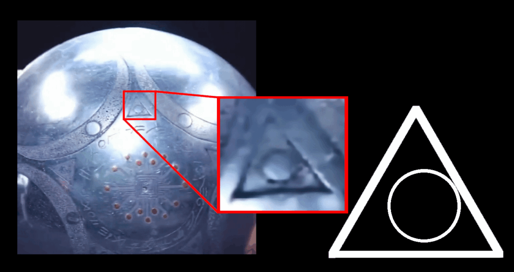 Buga Sphere is supposedly advanced alien technology, yet the aliens can't put a circle perfectly inside a triangle? This looks like hand etching.