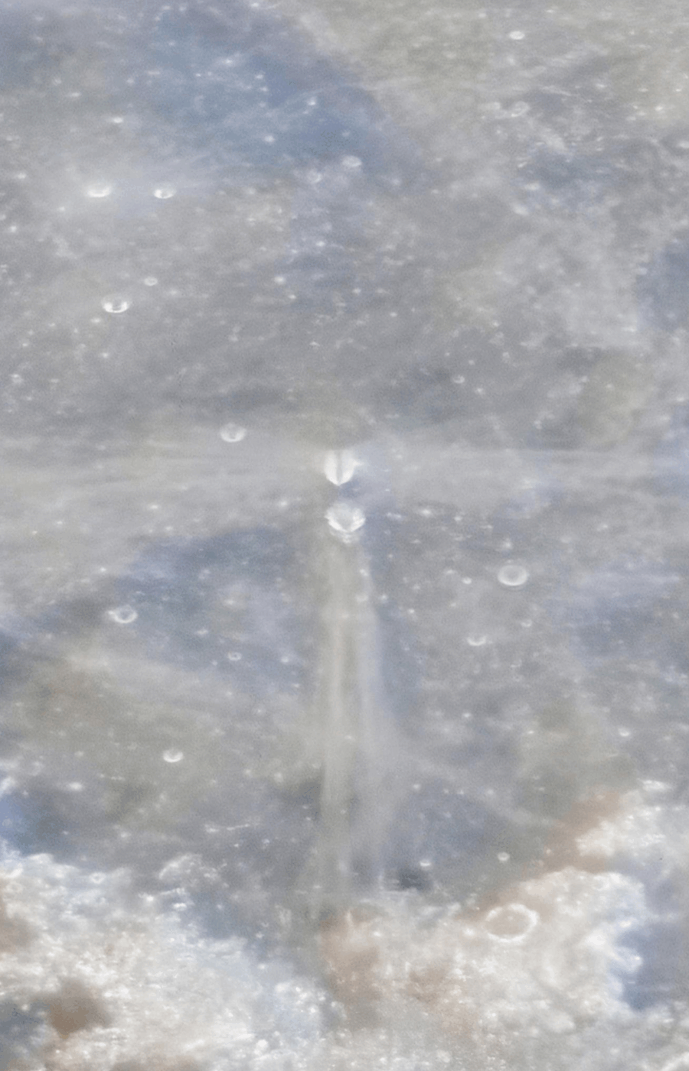 I've been checking out the Andrew McCarthy moon photo and I'm wondering what caused these marks. The verticle and horizontal lines and the strange 'non' craters