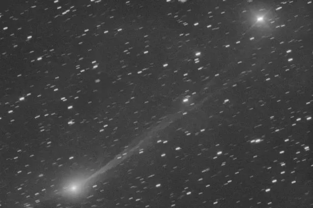 Interstellar comet 3I/ATLAS as it streaks through space