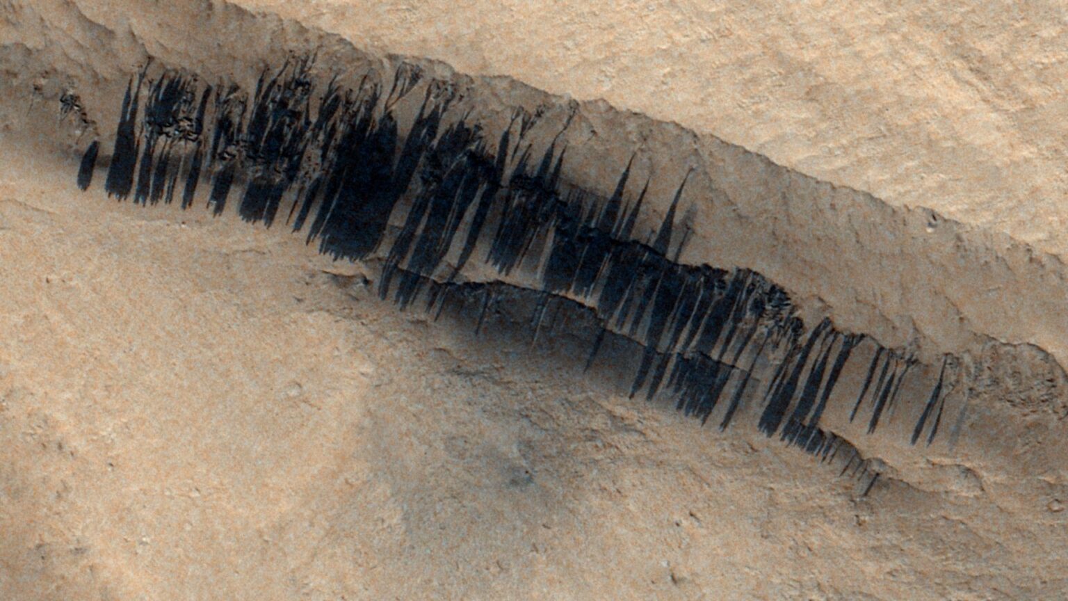 Mars orbiter spies 'barcode' aftermath of rare Red Planet avalanche caused by meteoroid impact