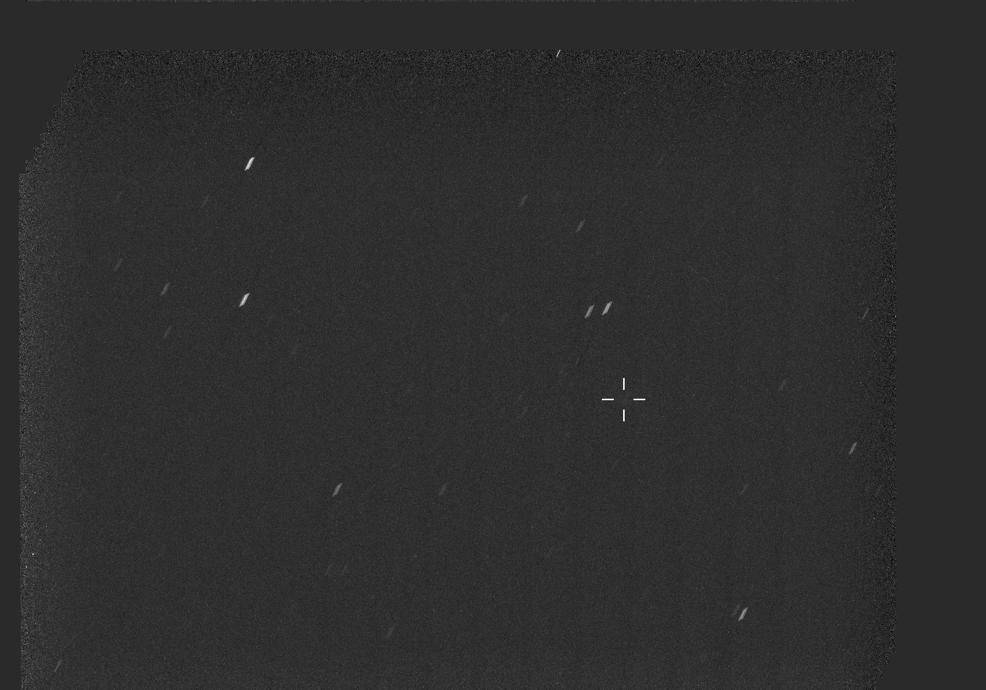 A grayscale gif showing various white dots including one of comet 3I/ATLAS