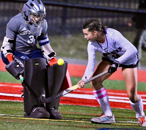 Crestwood goalie Madi Geiger makes a pad save on a...