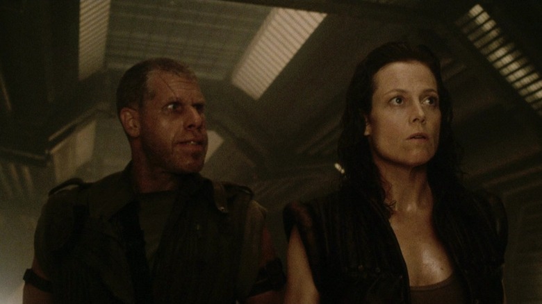 Ripley and Johner walk through a corridor in Alien: Resurrection