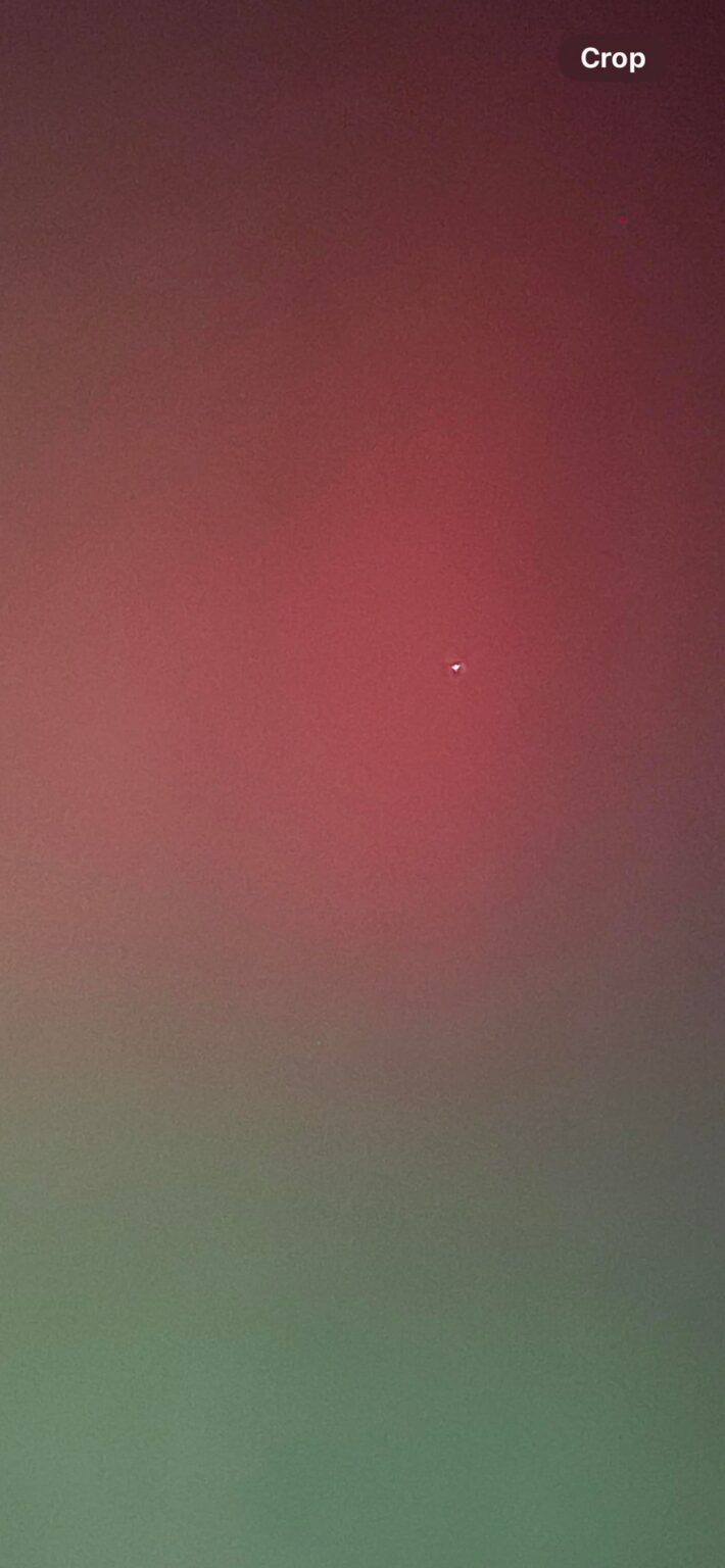 Northern Lights. Look close. Something is there.