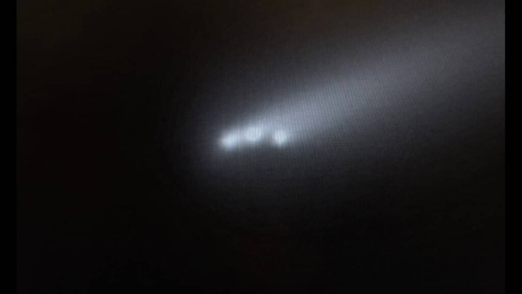 Comet dramatically breaks up into three brighter parts