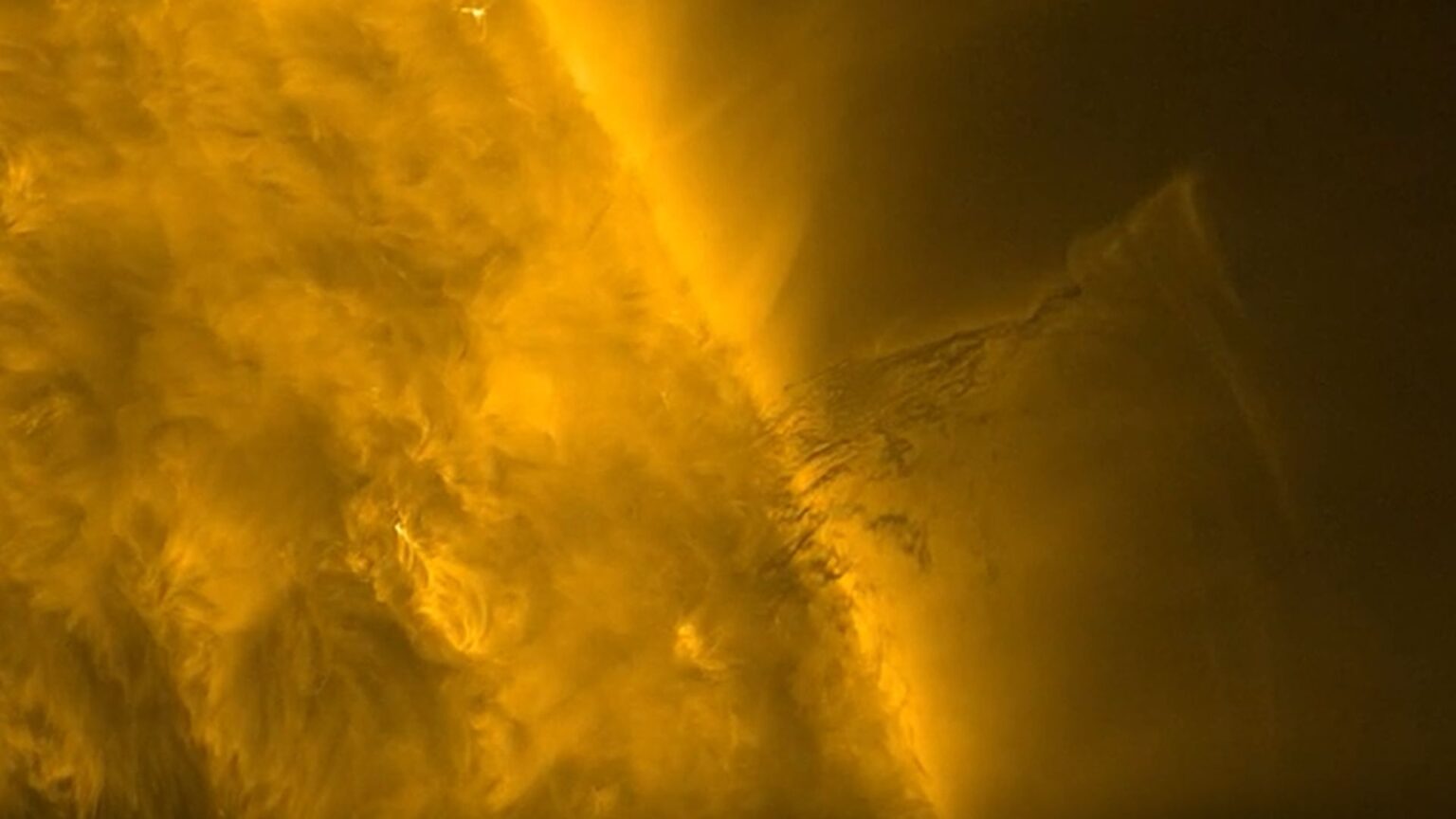 Dark plasma dances over the sun photo of the day for Nov. 26, 2025