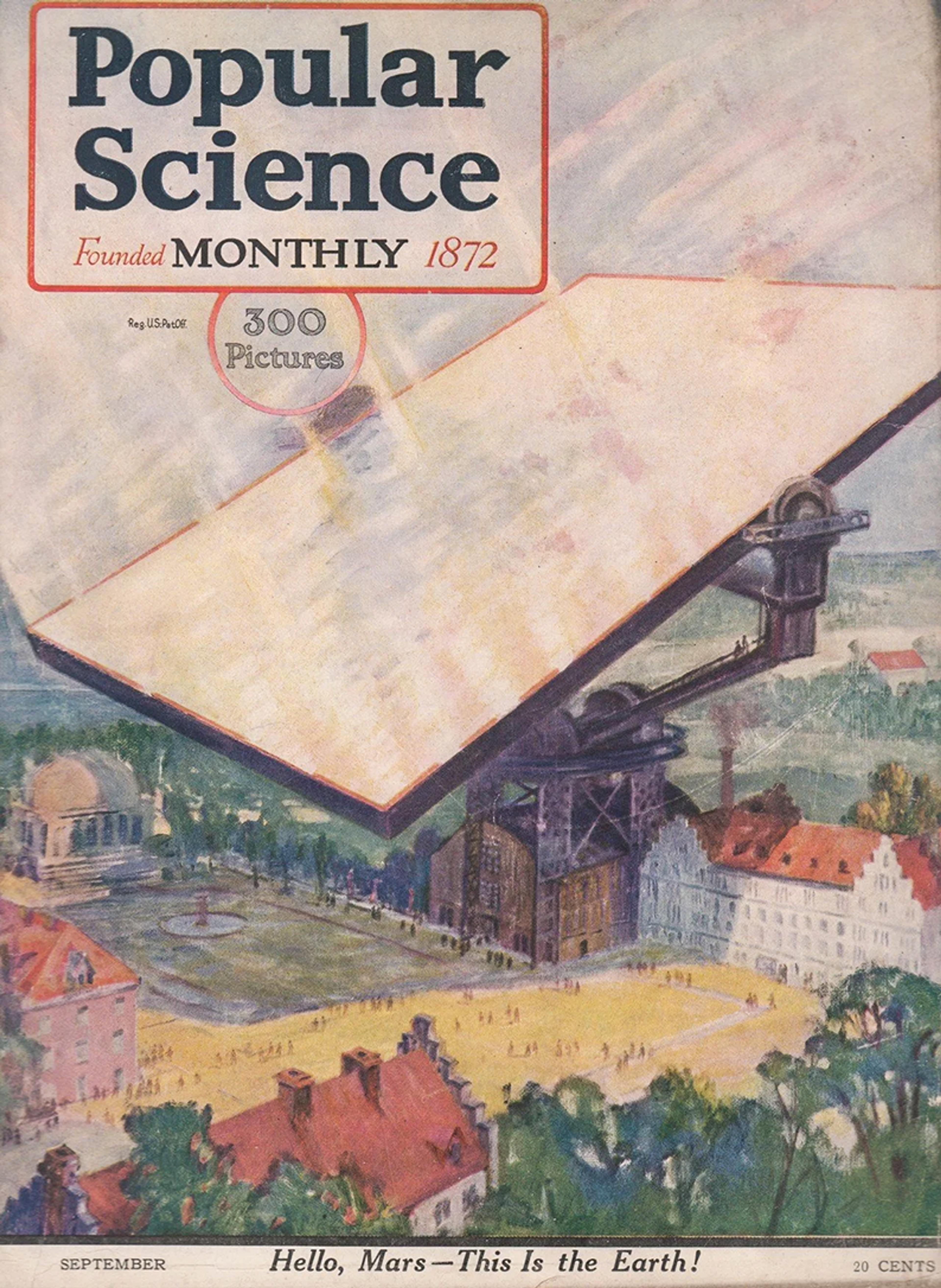 Cover of Popular Science magazine with a painting of a giant reflecting device over a cityscape, text says: ‘Hello, Mars – This is the Earth!’