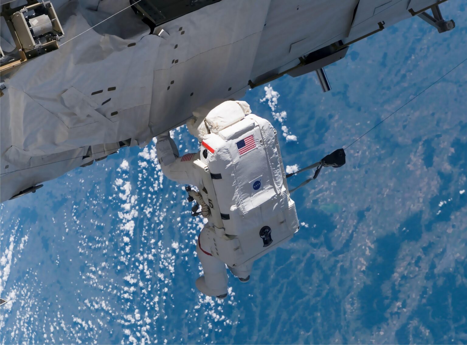 It was "installation day" on the International Space Station on Sept. 12, 2006. The Atlantis and Expedition 13 crews worked on attaching the P3/P4 truss during the first of three scheduled spacewalks by STS-115 shuttle crewmembers.