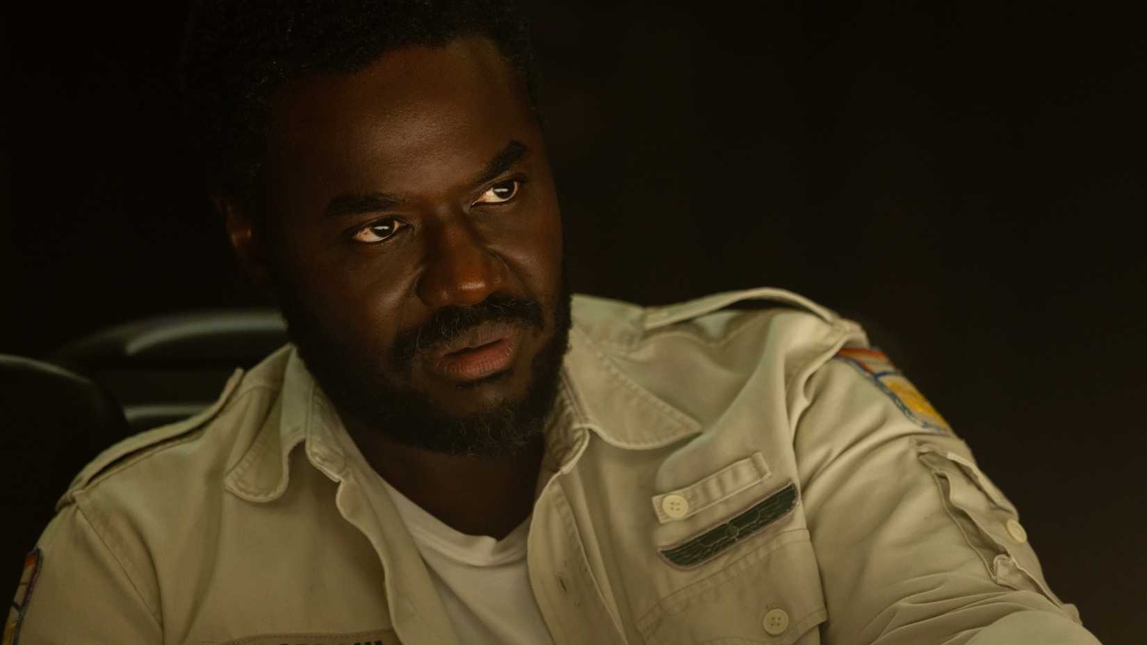 Morrow (Babou Ceesay) glares at something off-screen.