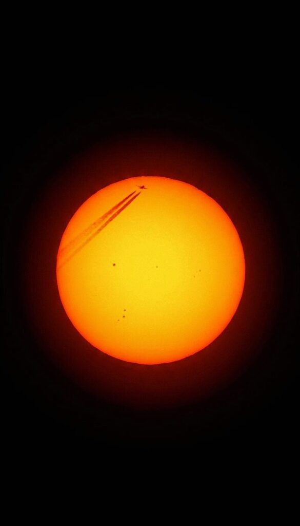 Was trying to image some Sunspots this morning and captured this!