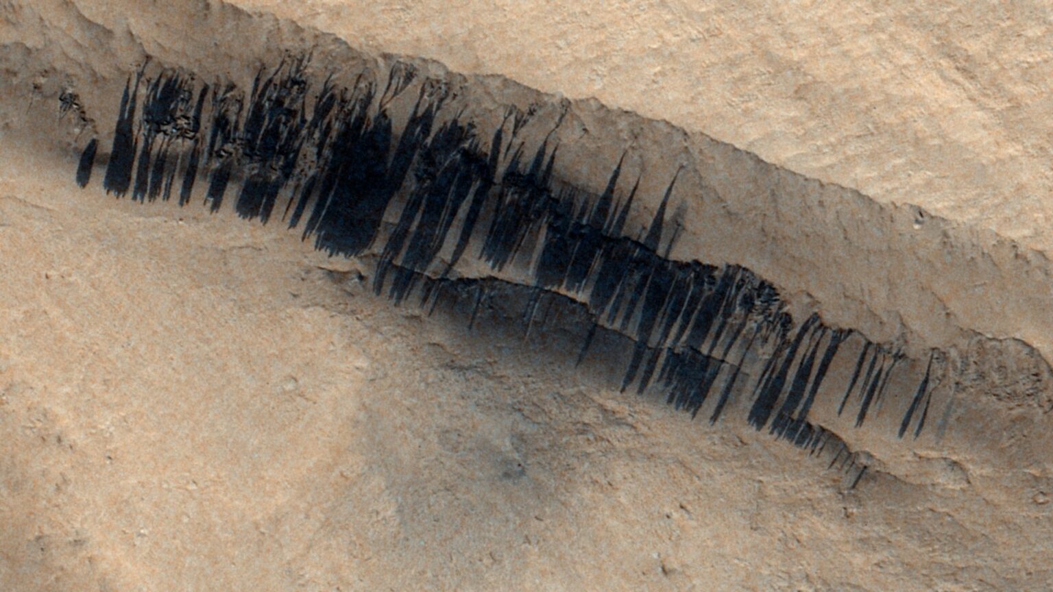 Mars orbiter spies 'barcode' aftermath of rare Red Planet avalanche caused by meteoroid impact