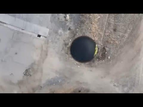 Amazing footage of a circular UFO with a sign flying over California.