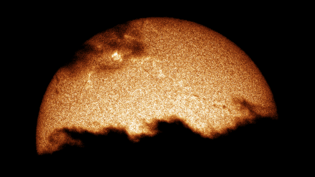 Sun peeking through the clouds.