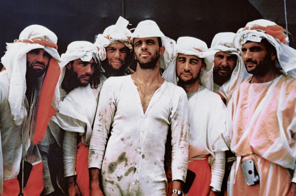 The seven original Mercury astronauts after participating in survival training exercises in Nevada July 1960