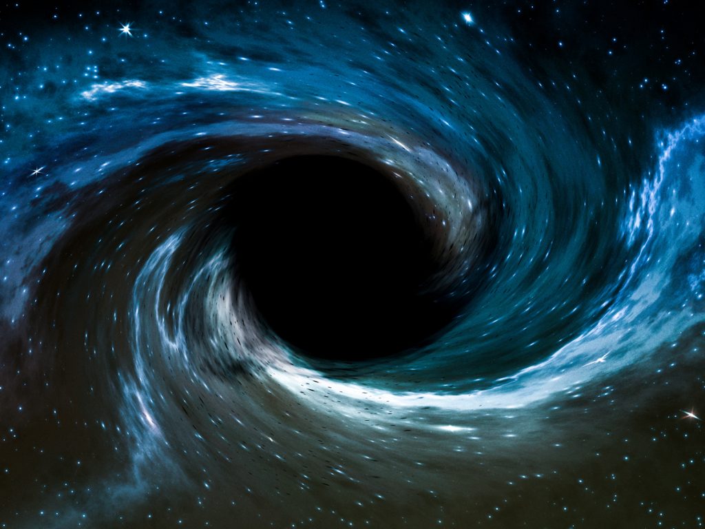 Black hole with luminous blue and white accretion disk swirling in star-filled space.