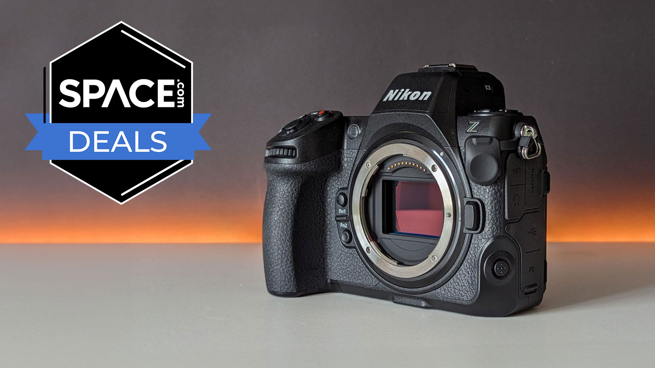 A Nikon Z8 showing a maroon sensor on a white table with an orange line across the background and a black Space.com deals badge in the upper left corner.
