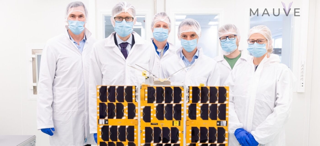 Mauve space telescope with scientists