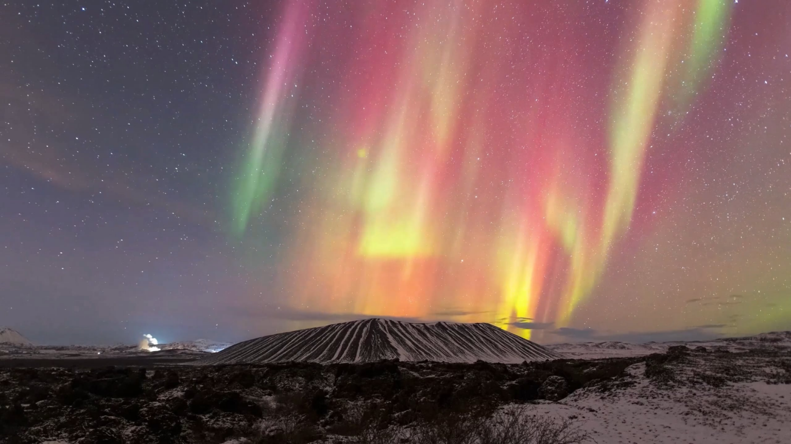 Dancing aurora above Hverfjall volcano
