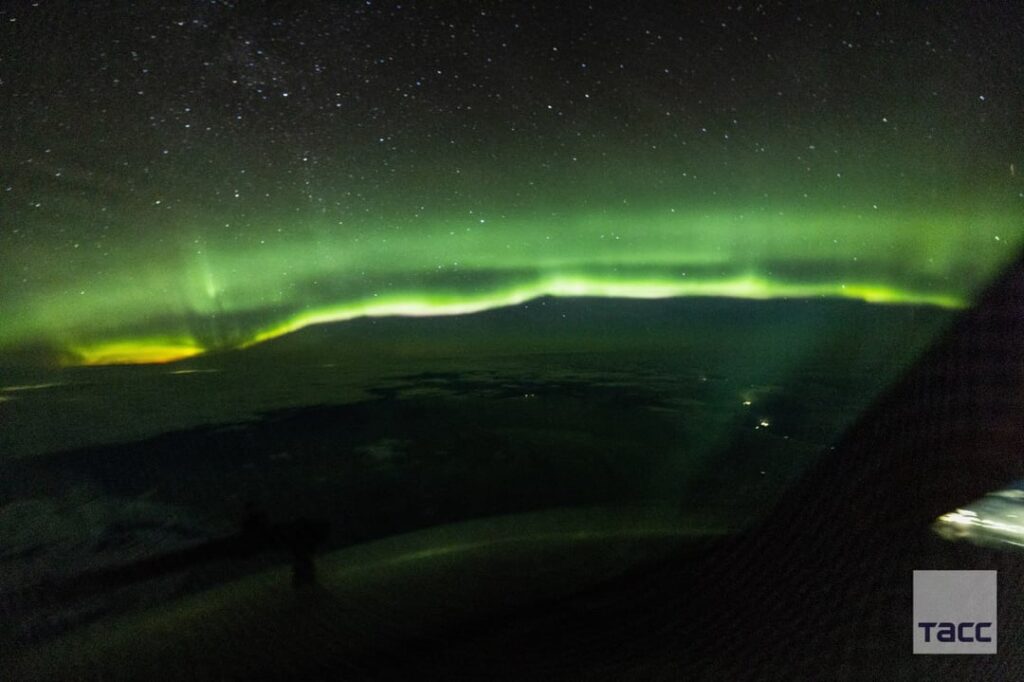 Geminid meteor shower and northern lights in Russia