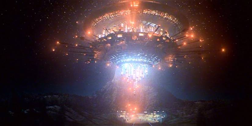 the mothership hovers above the landing strip in in close encounters of the third kind