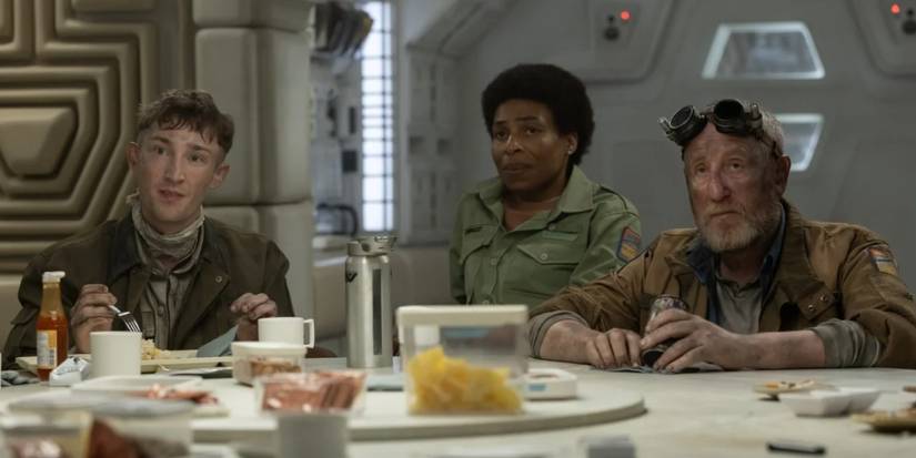 Chibuzo and Malachite sitting at a table aboard the Maginot ship in Alien: Earth