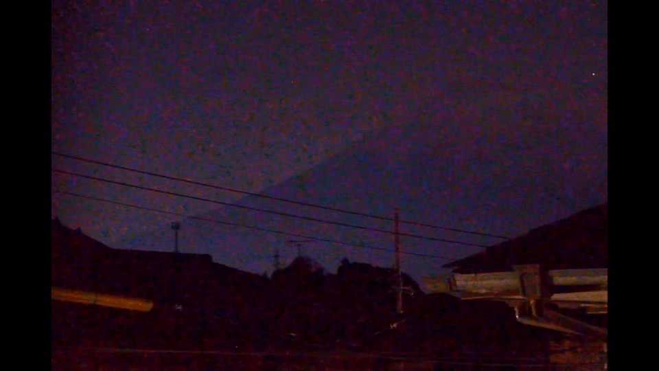 Bright fireball next to Mount Fuji