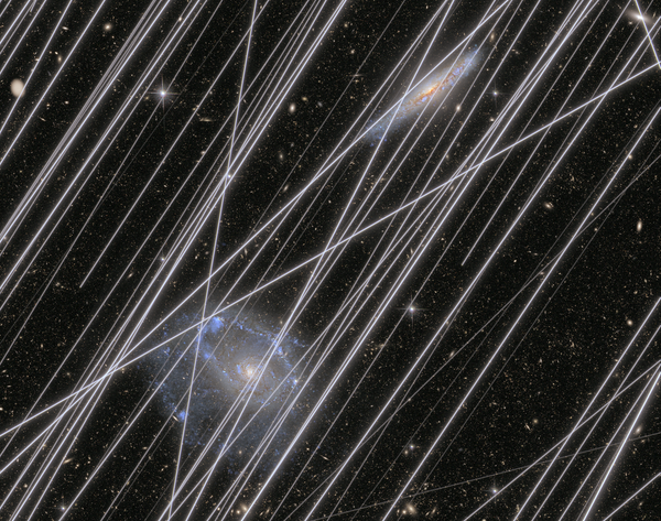 An image of a starry night covered with bright streaks
