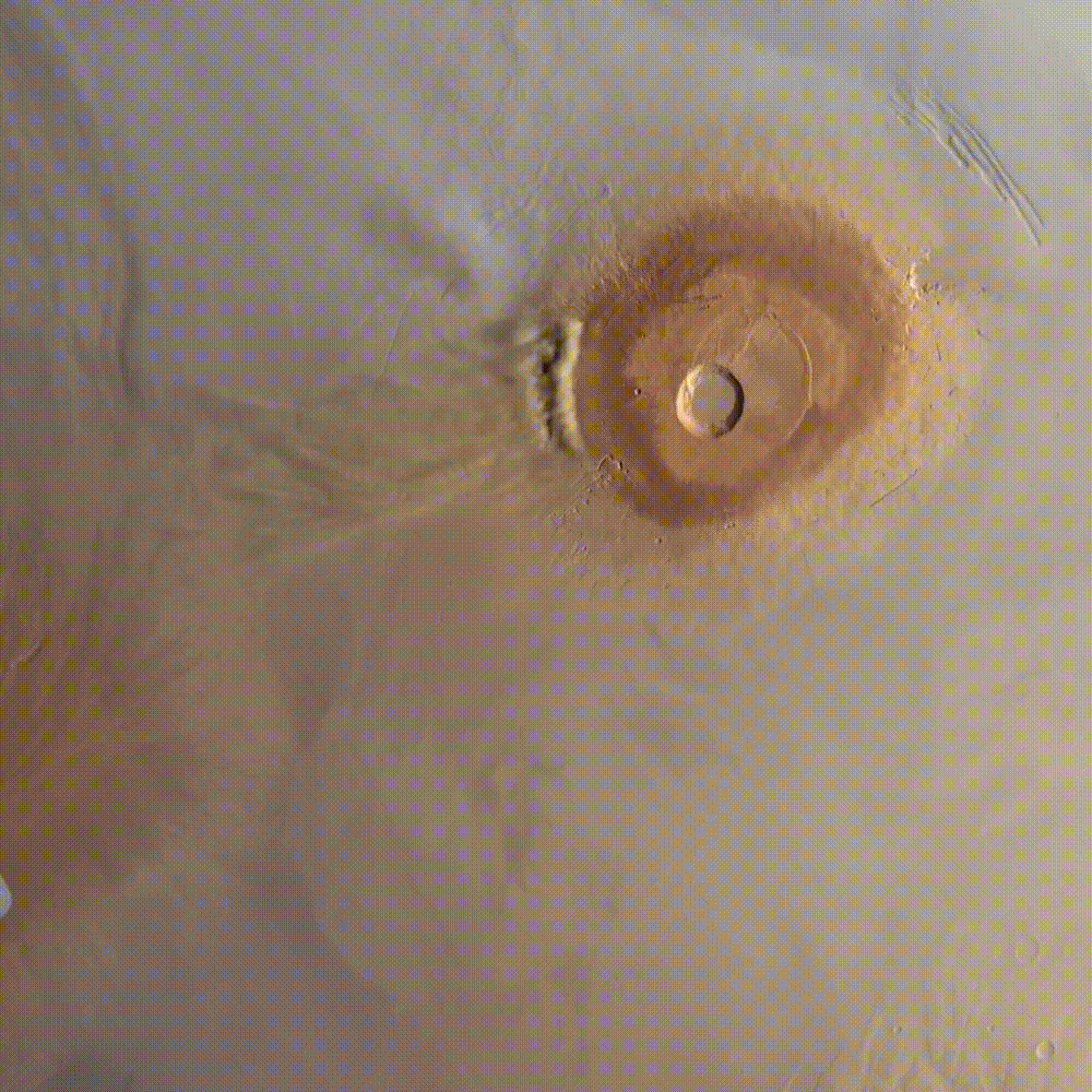Video of epic Phobos passing over a Martian dust storm near Pavonis Mons. Processed by Andrea Luck