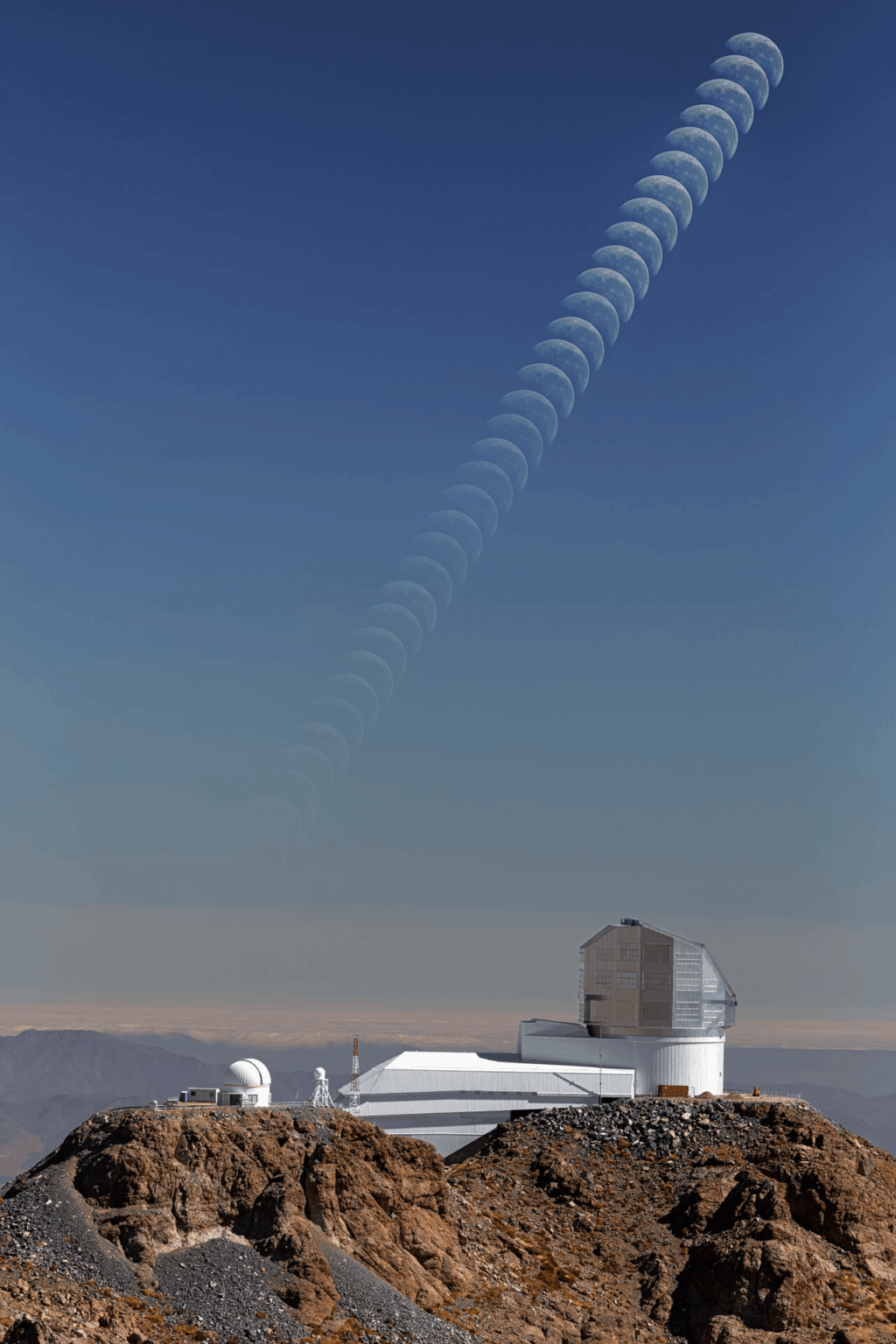 Moonset Above Rubin. The Moon sets in a bright sky over NSF–DOE Vera C. Rubin Observatory. By Petr Horálek
