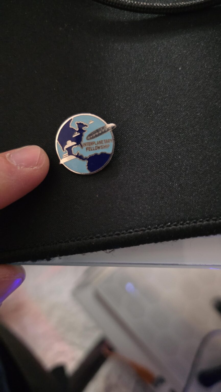 Can anyone identify this pin, or know anything about it?