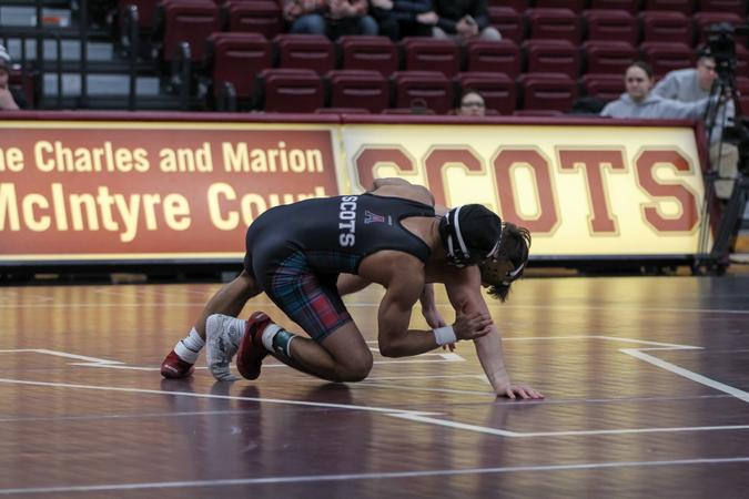 Men's Wrestling Taken Down by Comets