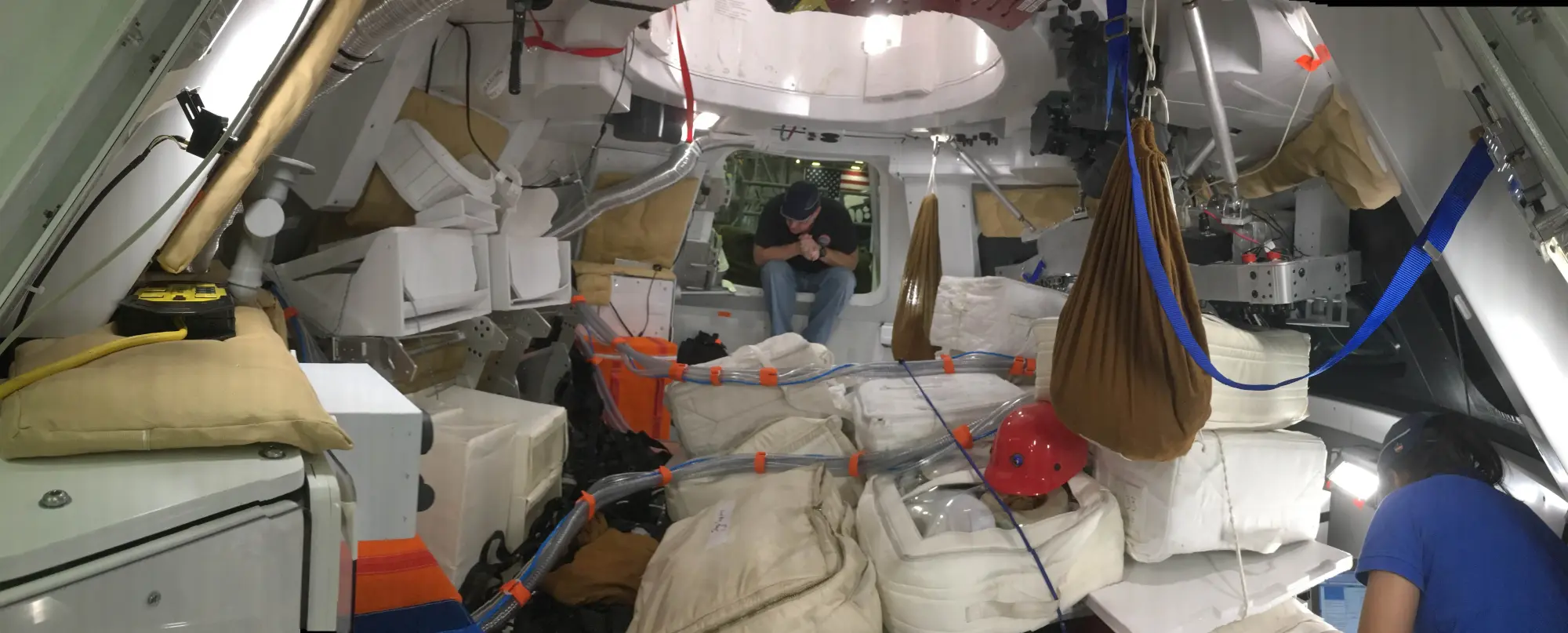 Building a radiation shelter within the Orion spaceship during the Artemis 2 mission