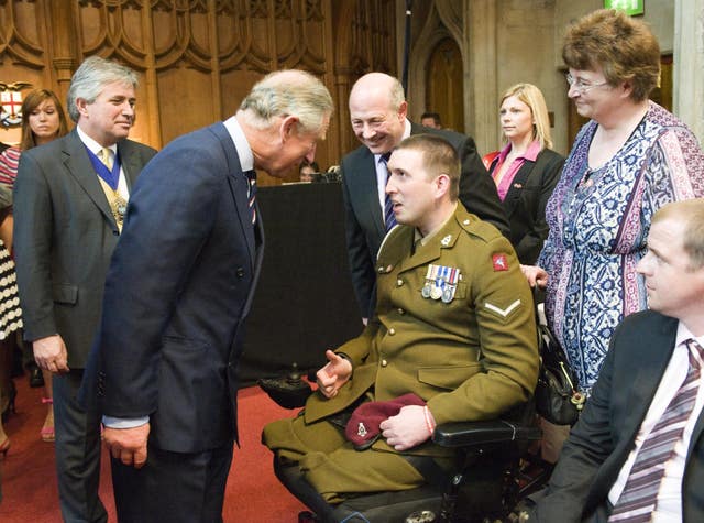 Ben Parkinson, in his dress uniform, meets the then-prince of wales