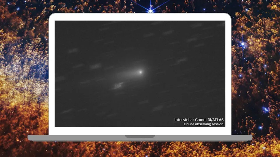  The ghostly light of a distant comet is pictured on the screen of a laptop as it travels across a distant starscape. The words 'Interstellar Comet 3I/ATLAS online observing session are visible to the lower right of the screen. The laptop is pictured against a deep space background composed of blue white stars and puffs of interstellar dust and gas. 