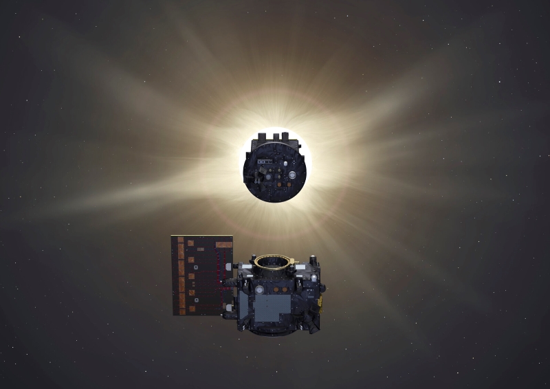 A circular spacecraft blocking the sun except for the glowing corona, with another spacecraft nearby.