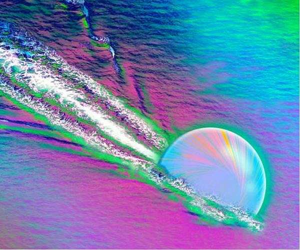 Quark wakes reveal early universe plasma flowed like a liquid