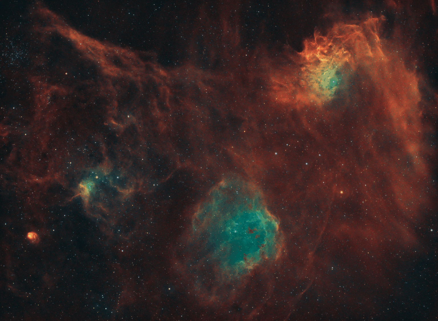Flaming Star and Tadpole Nebula