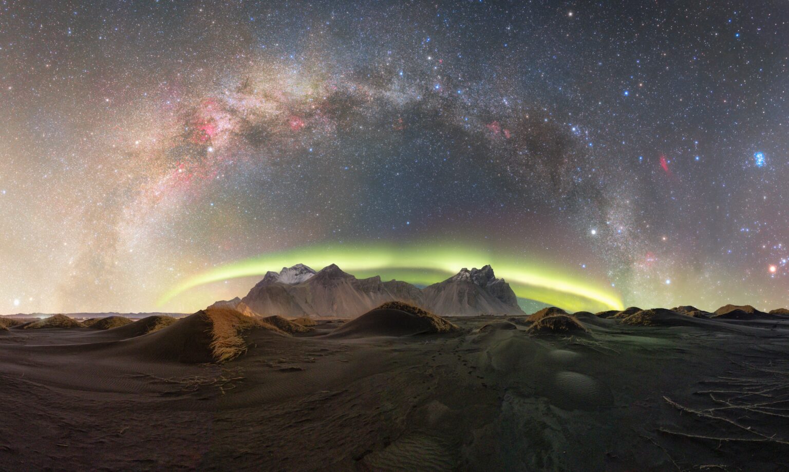 The moment the galaxy met the aurora - Iceland night panorama [OC]