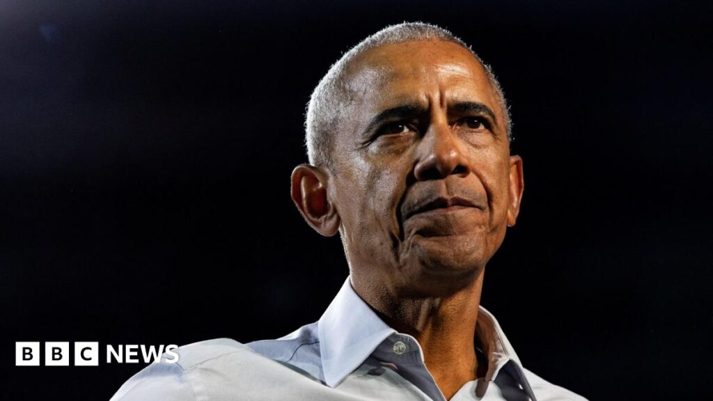A headshot of Barack Obama against a black background