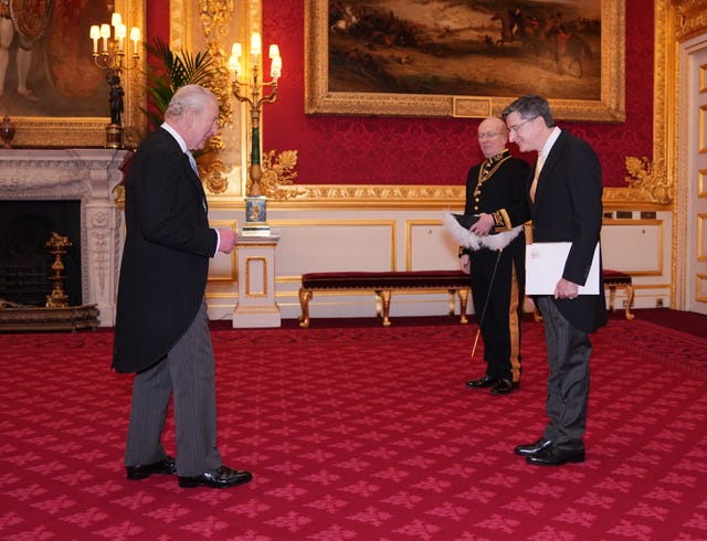 Francisco Lima Mena, Ambassador of El Salvador, presents his credentials during an audience with King Charles III