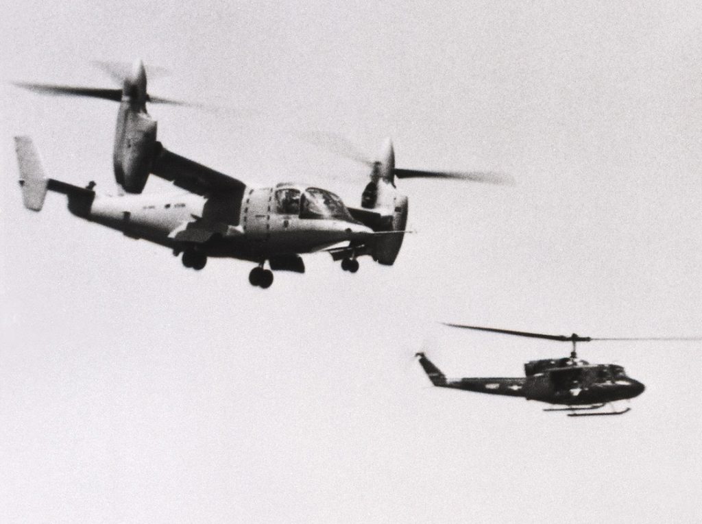 Bell XV 15 in flight with US Navy UH 1N 1983