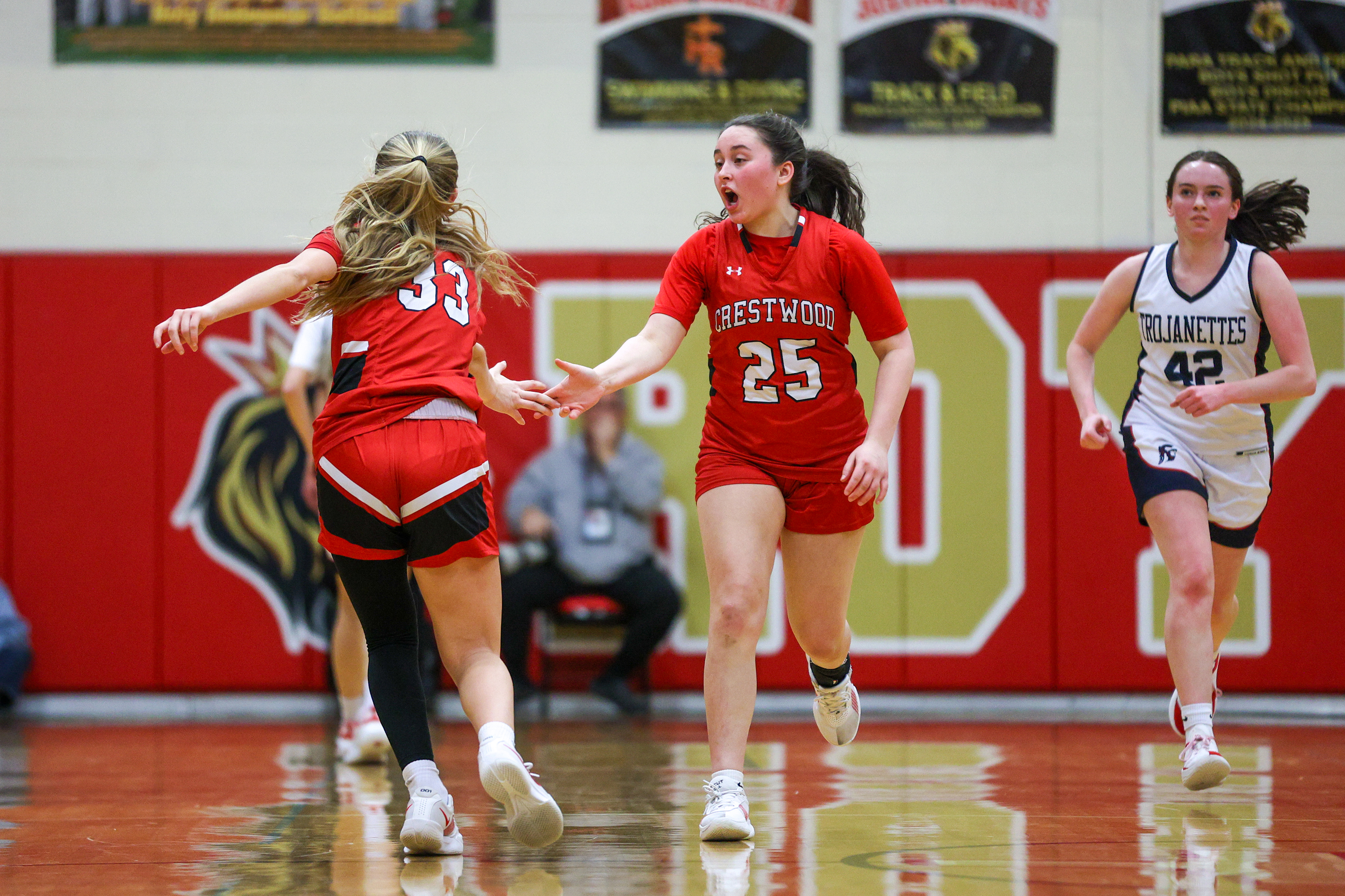Crestwood’s Norah Sklarosky (25) celebrates with Kiera Dougherty (33) after...