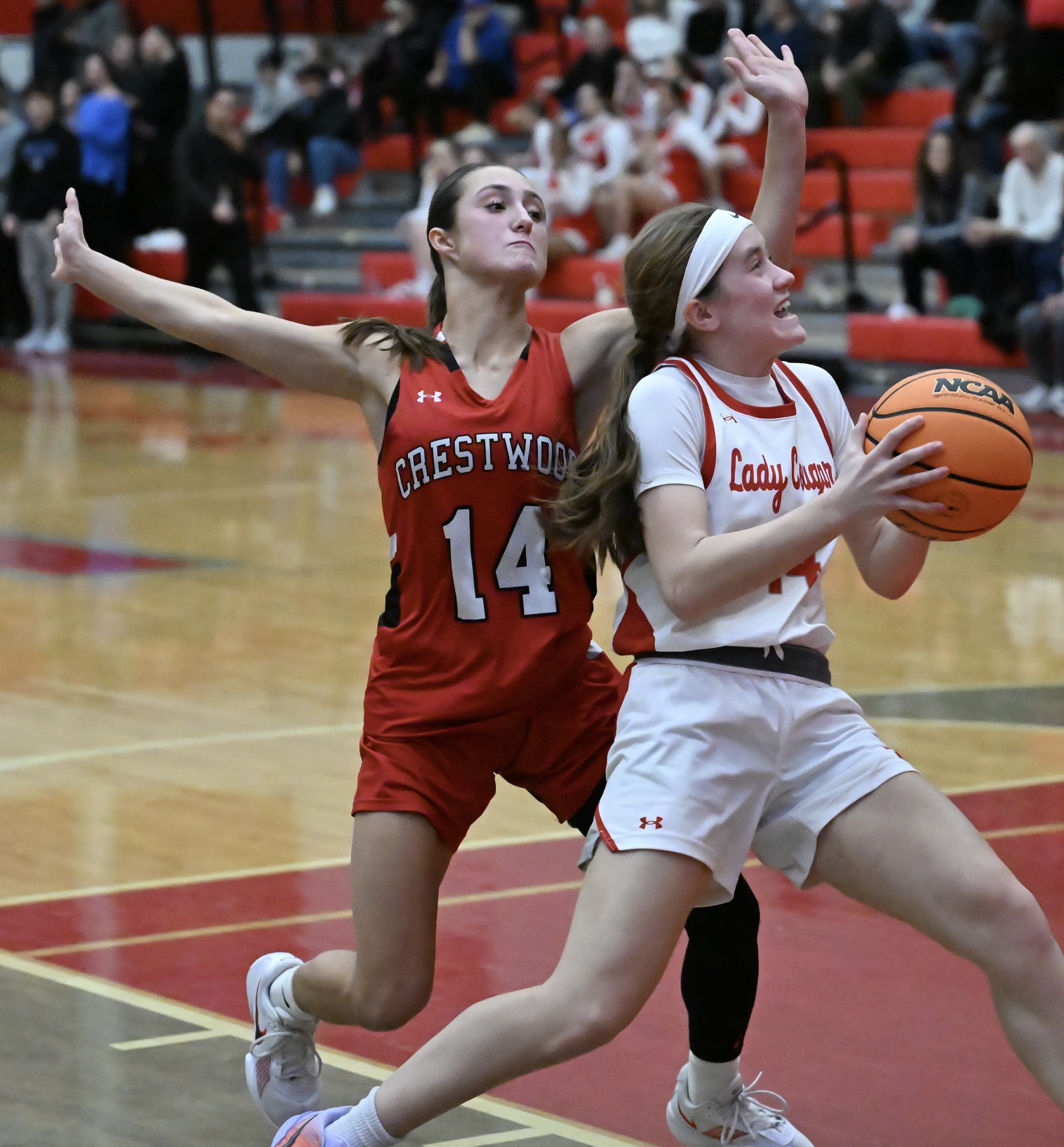 Hazleton Area’s Kaitlyn Bindas (14) drives past Crestwood’s Jordan Andres...