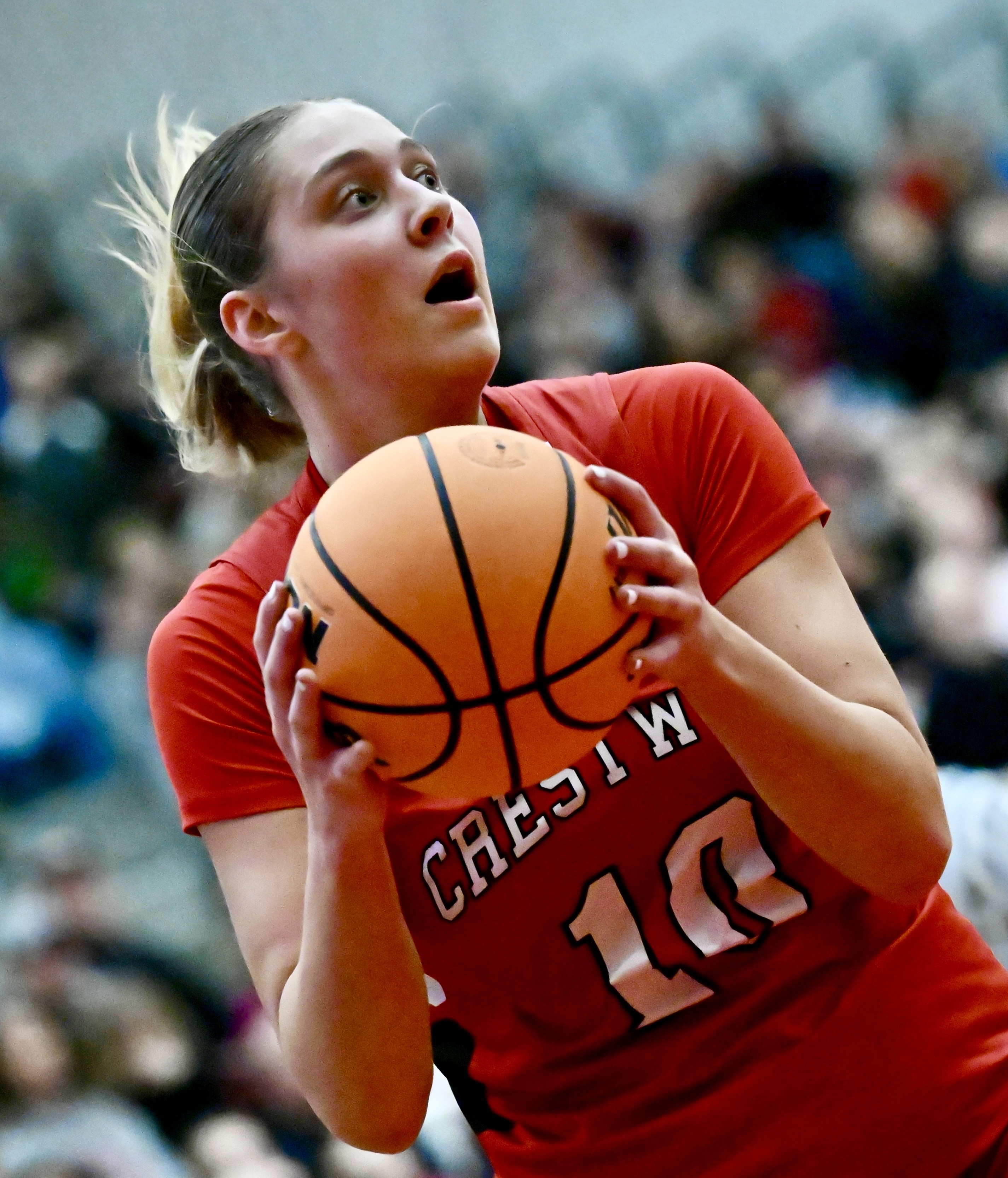 Crestwood’s Charlie Hiller (10) pulls down a rebound against Hazleton...