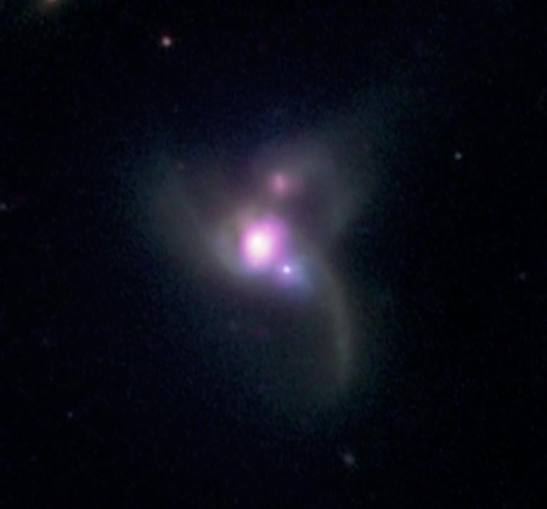 A Triple Black Hole System Caught in the Act of Self-Quenching