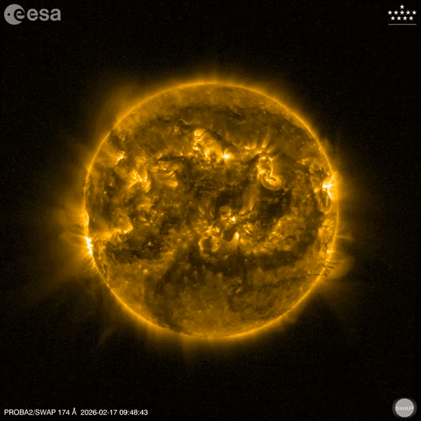 A video of the moon (a dark circle) appearing to pass over the sun four times at varying coverages